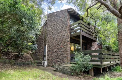 Bexley share house – Brick two-storey house with timber decks and garden