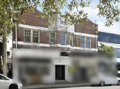 Rockdale share house – Upstairs residence in a 1921 brick building above shops